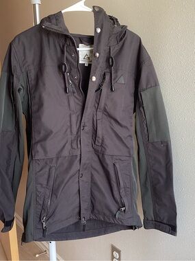 Lightweight Black Hooded Raincoat with Olive Contrast Panels